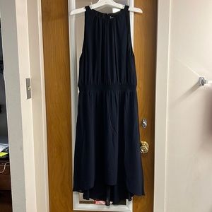 A navy blue dress in the size 8